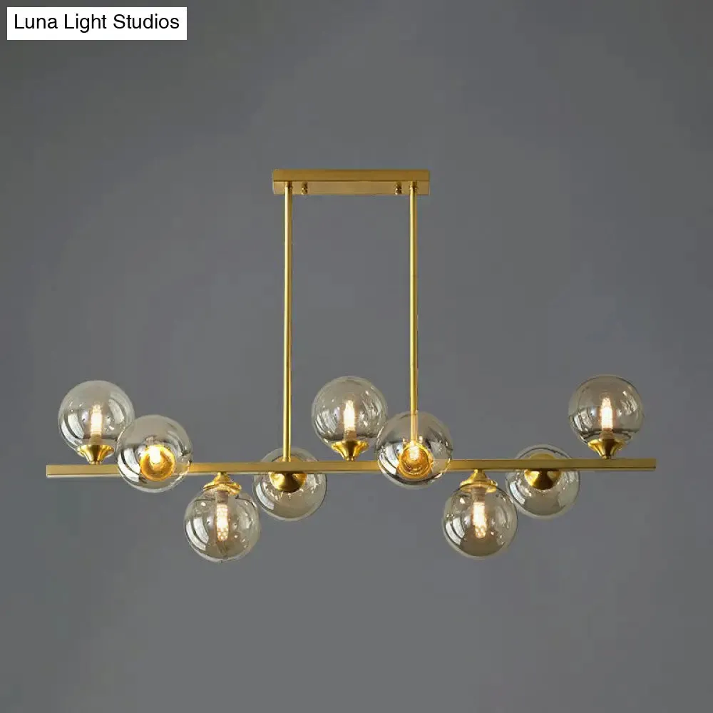 Postmodern Gold Finish Amber Glass Ball Island Hanging Lamp for Table Illumination