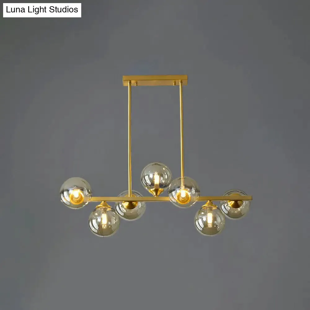 Postmodern Gold Finish Amber Glass Ball Island Hanging Lamp for Table Illumination